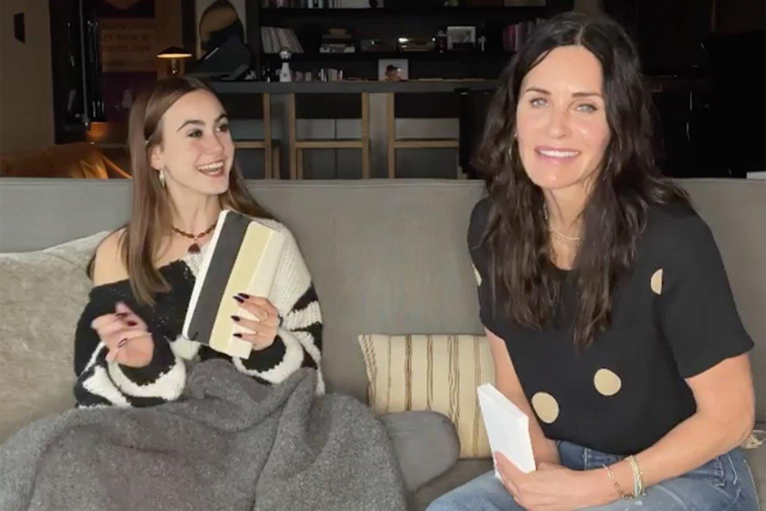 Coco and Courteney Cox playing game