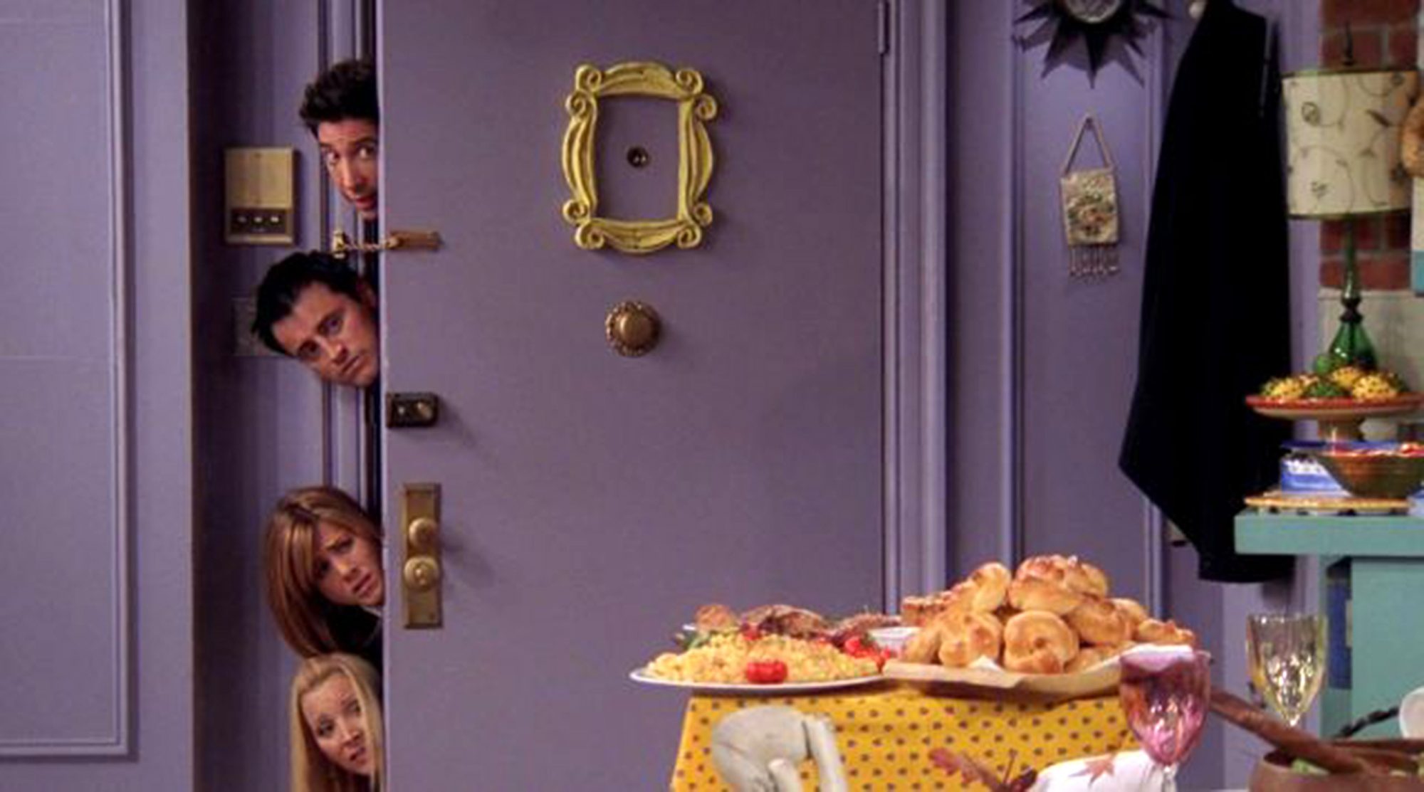 Monica door with phoebe, joey, ross, and rachel