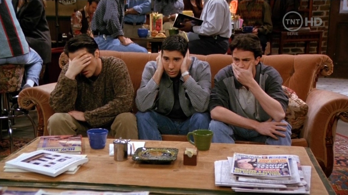 Ross-Joey-Chandler-Sitting-on-the-orange-couch