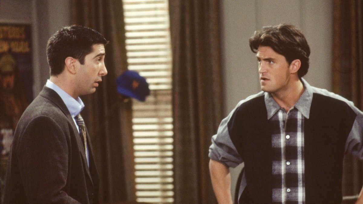 Ross and Chandler talking with each other